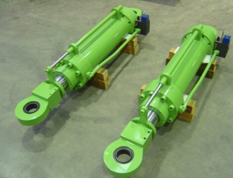 WB oven lifting cylinders with valve block and position control system.